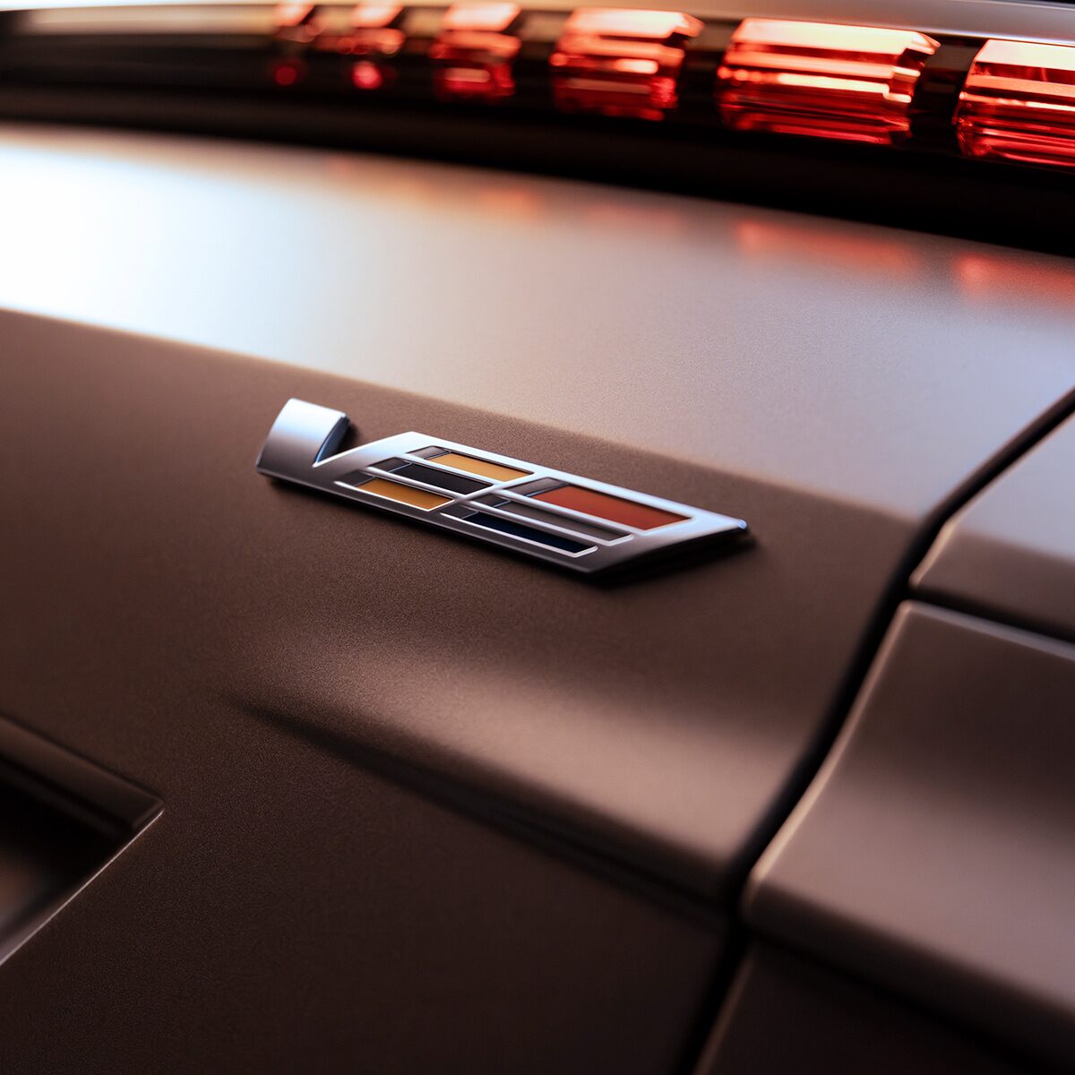 Lower Driver's Side View of Orange Cadillac V-Series Model