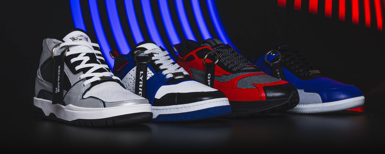 A Line-up of Four Different Customized Sneakers in White, Red, Blue, Black, and Grey