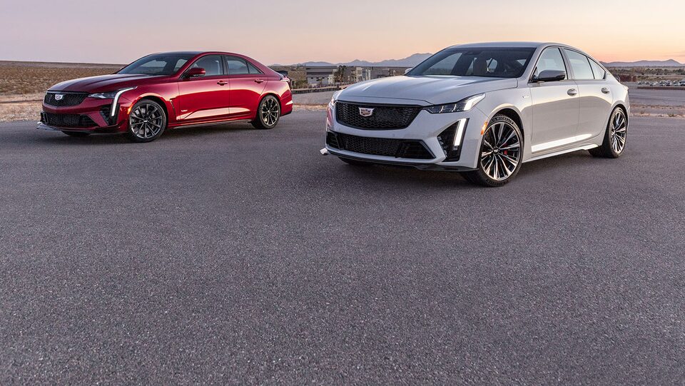 Cadillac Sedans Wide View During Sunset