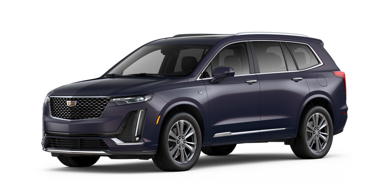 Vista de tres cuartos de un Cadillac XT6 azul noche
