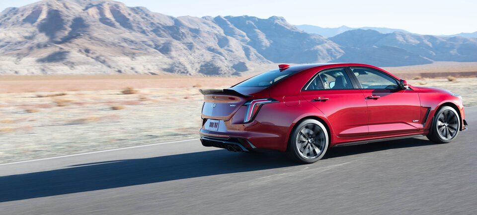 2022 Cadillac CT4-V Blackwing Sport Sedan Exterior Side View Driving