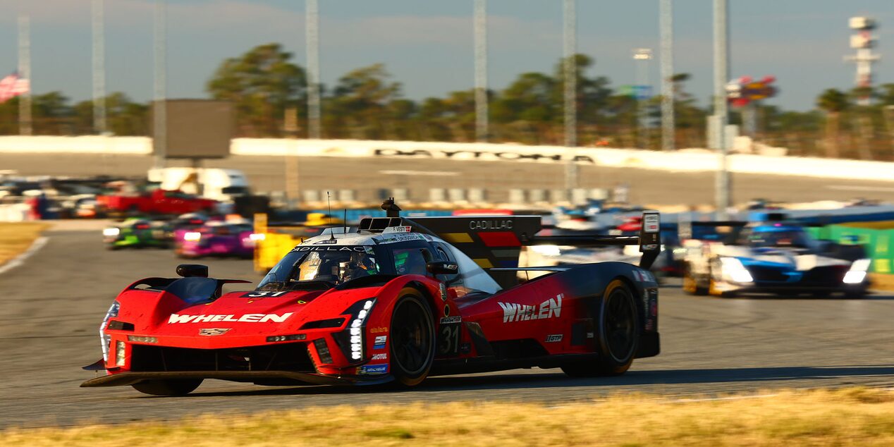 Close-up of the V-Series Cadillac Racing Logo on the Pink Racecar