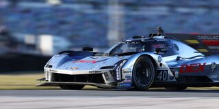 Close-up of the V-Series Cadillac Racing Logo on the Red Racecar