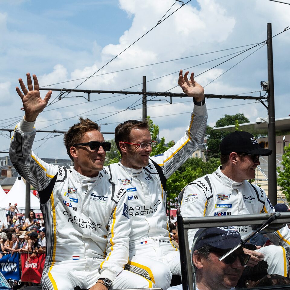 Cadillac Racing Drivers Waving At Fans
