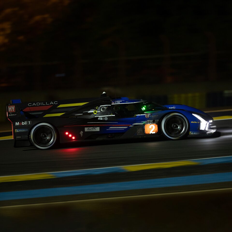 Cadillac V-Series.R Race Car Driving At Night On Track