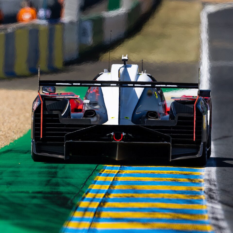 Rear View Of Back End Of Cadillac V-Series.R Race Car On Side Of Track