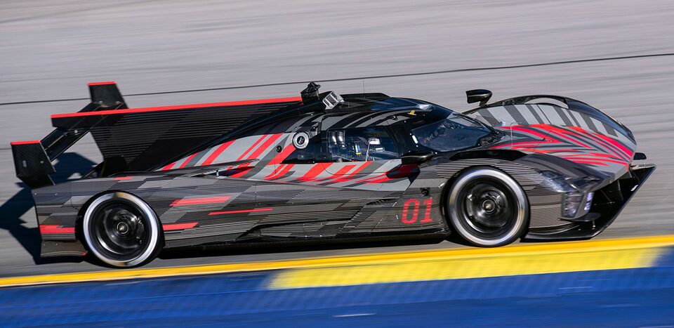 Cadillac Racing lmdh-V Zooming on Race Track