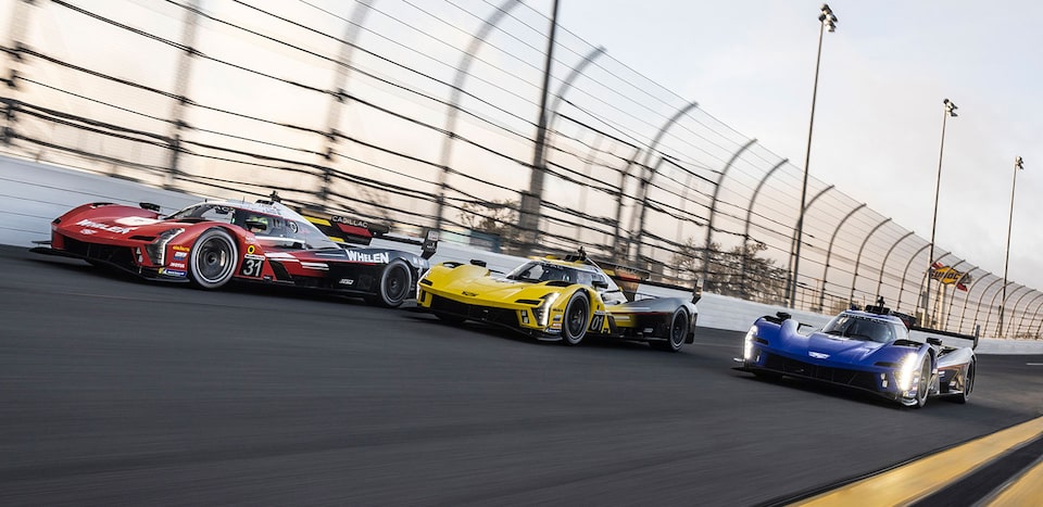 Cadillac Racing V-Series.R Zooming on Race Track
