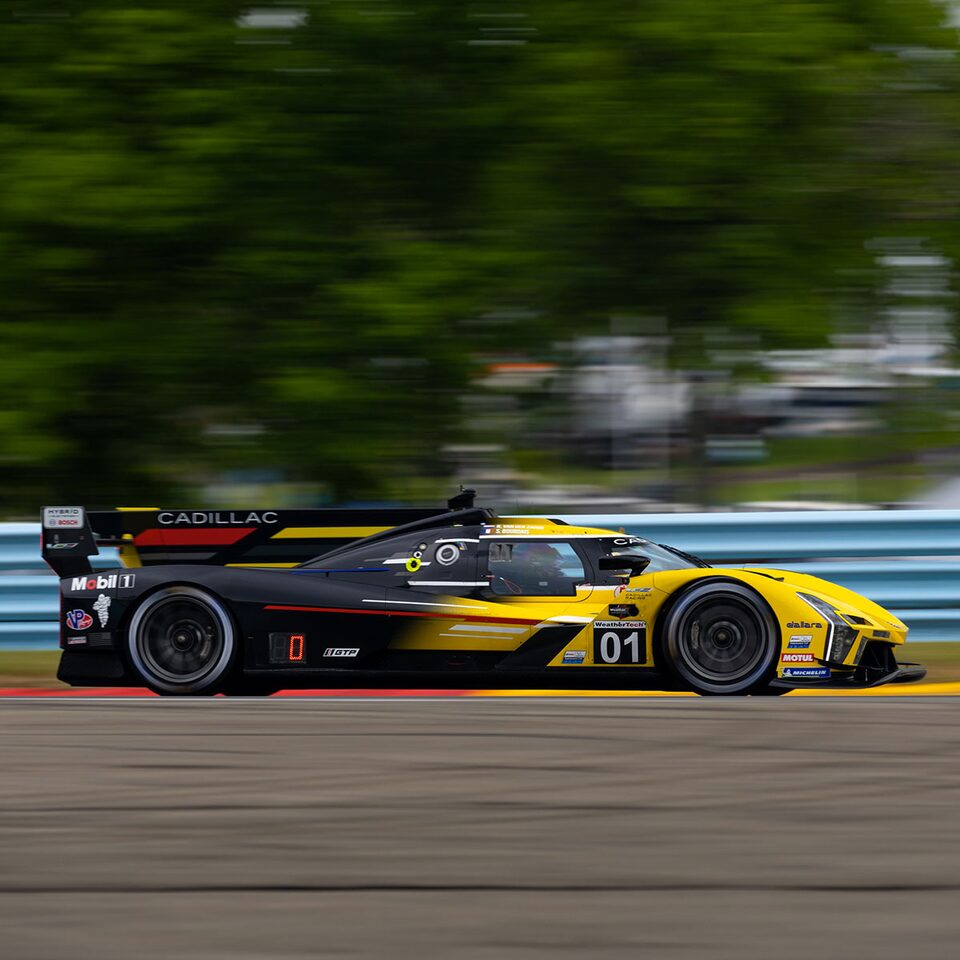 Side Profile Of The Cadillac V-Series.R Speeding Down Straight Away