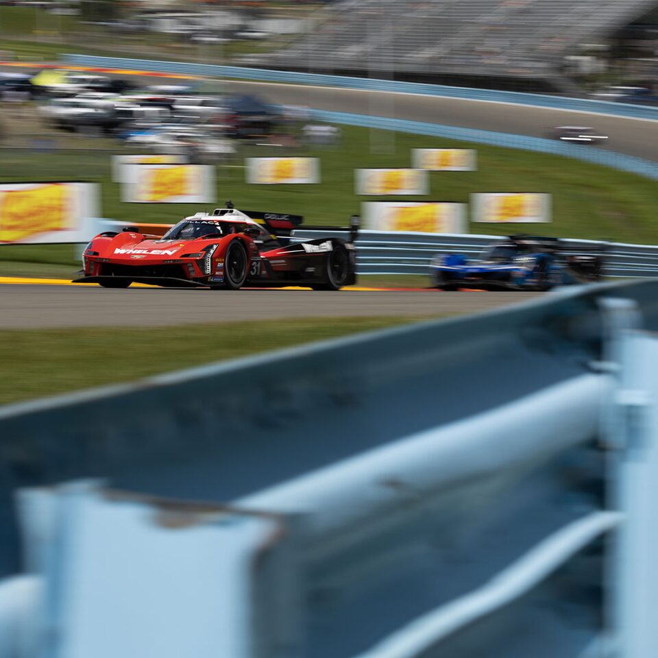 Cadillac V-Series.R Race Car Pulling Ahead On The Track
