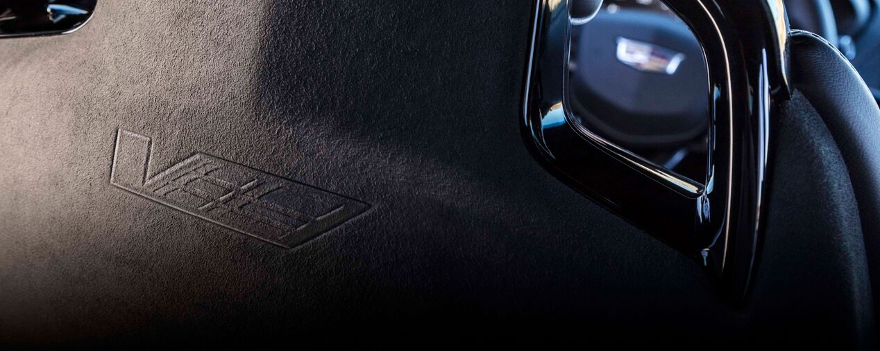 Close-up View of the V-Series Logo Detailed into the MicroFiber of a V-Series Vehicle Interior