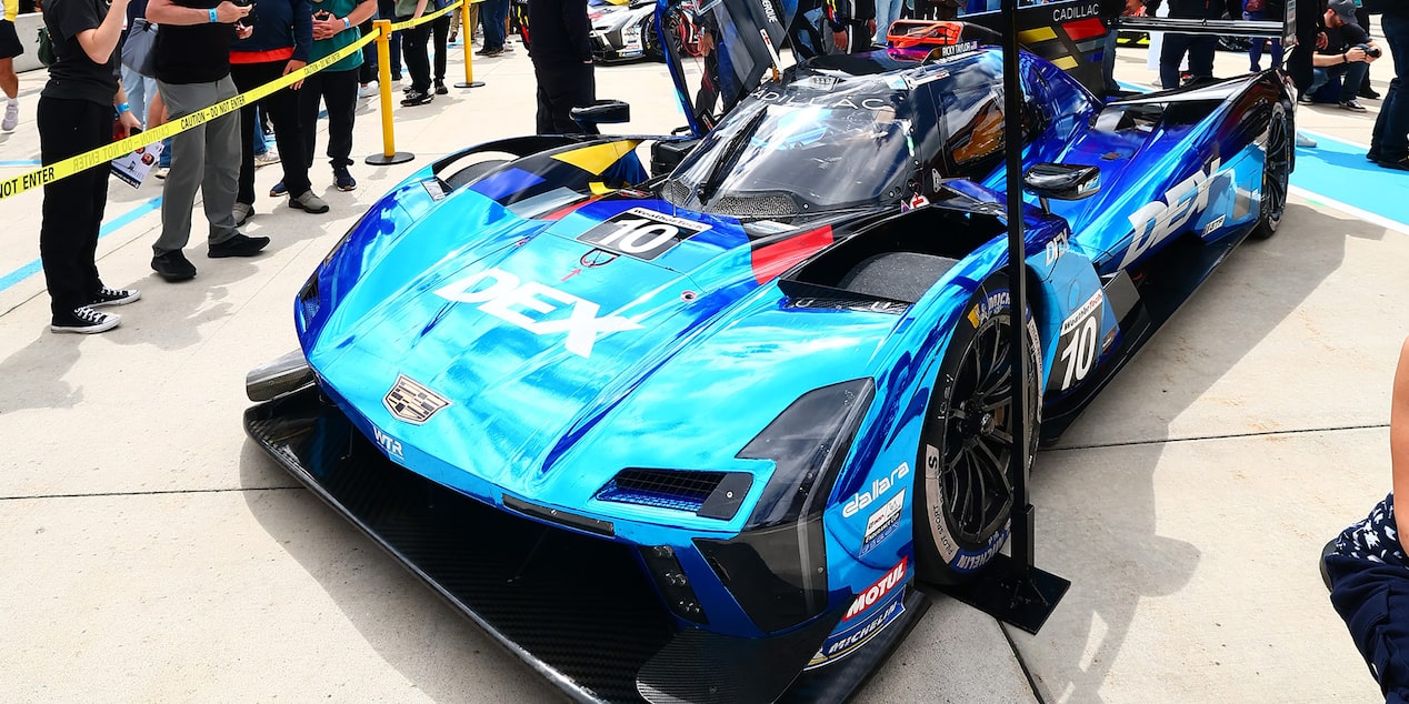 Front View of the Yellow V-Series.R Racecar with the Butterfly Doors Open