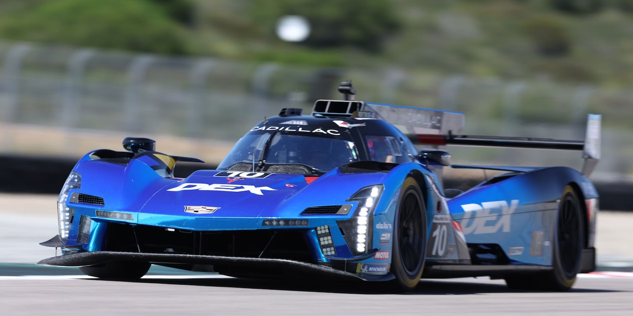 Front View of the Yellow V-Series.R Racecar with the Butterfly Doors Open