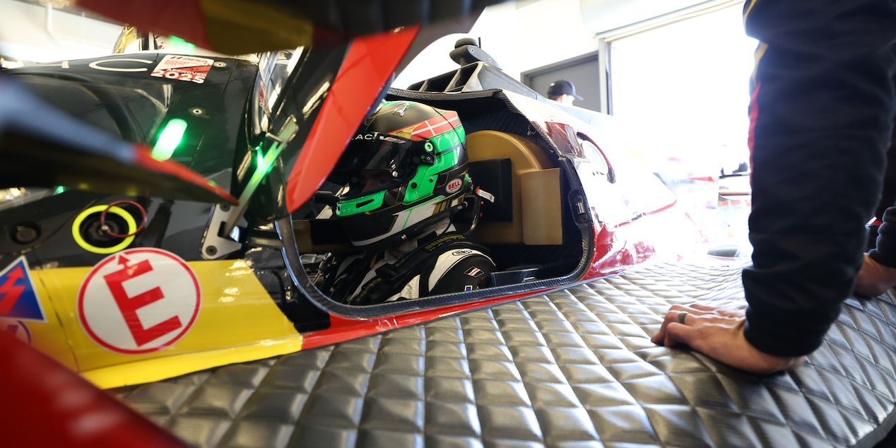 Front View of the Yellow V-Series.R Racecar with the Butterfly Doors Open