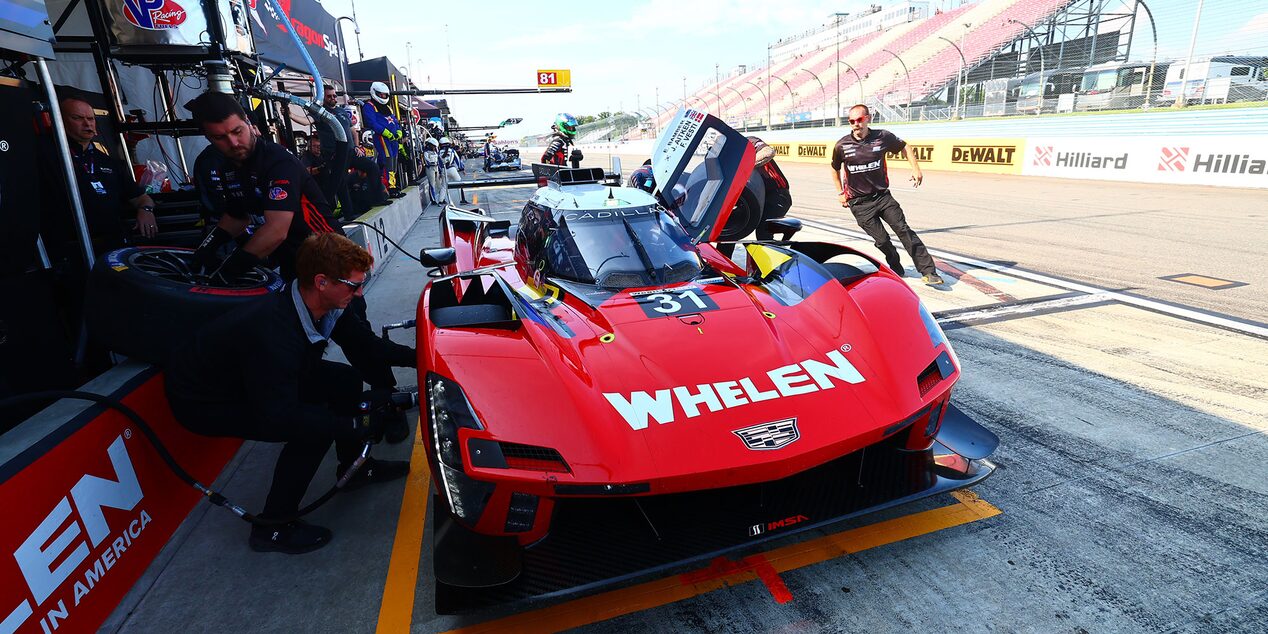 Close-Up of the Front of the V-Series Race Cars Parked and Lined Up Next to Each Other