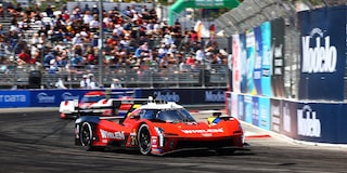 The Cadillac Racing Team Behind the Pink V-Series.R Racecar Celebrating the Petit Le Mans Victory