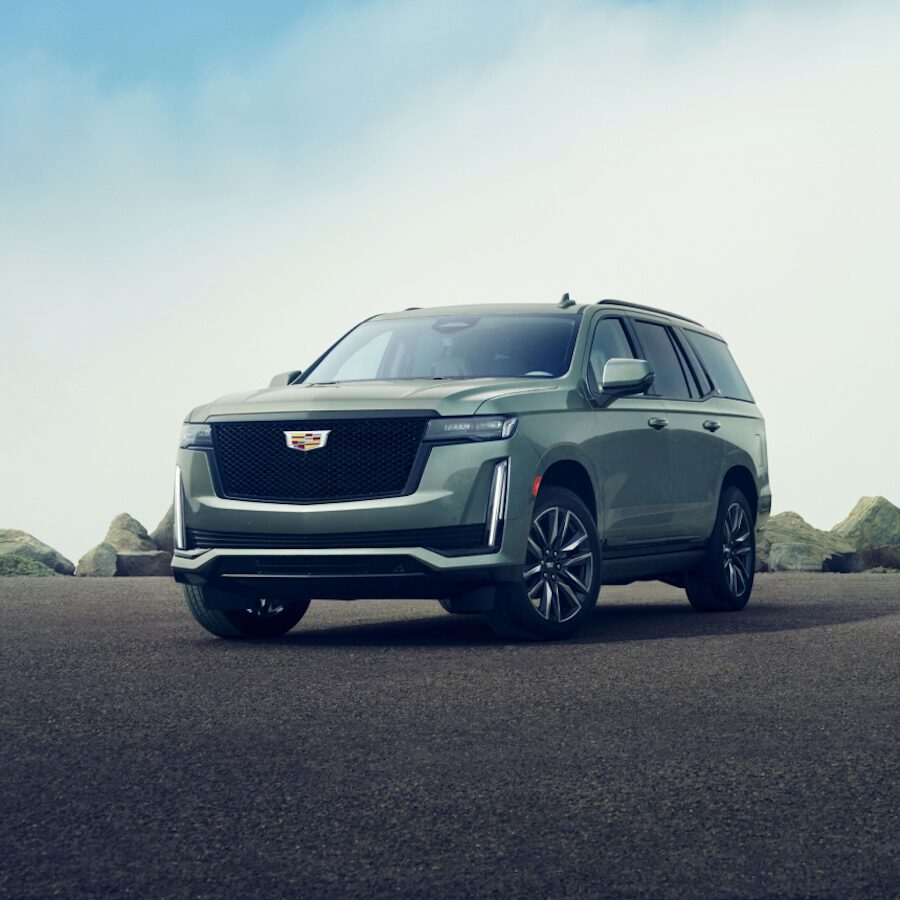 2023 Cadillac Escalade Parked on Gravel With Large Rocks In The Background