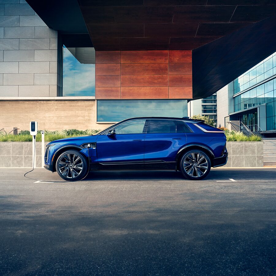 2024 Cadillac LYRIQ Parked in a Driveway of a Luxurious Modern Home