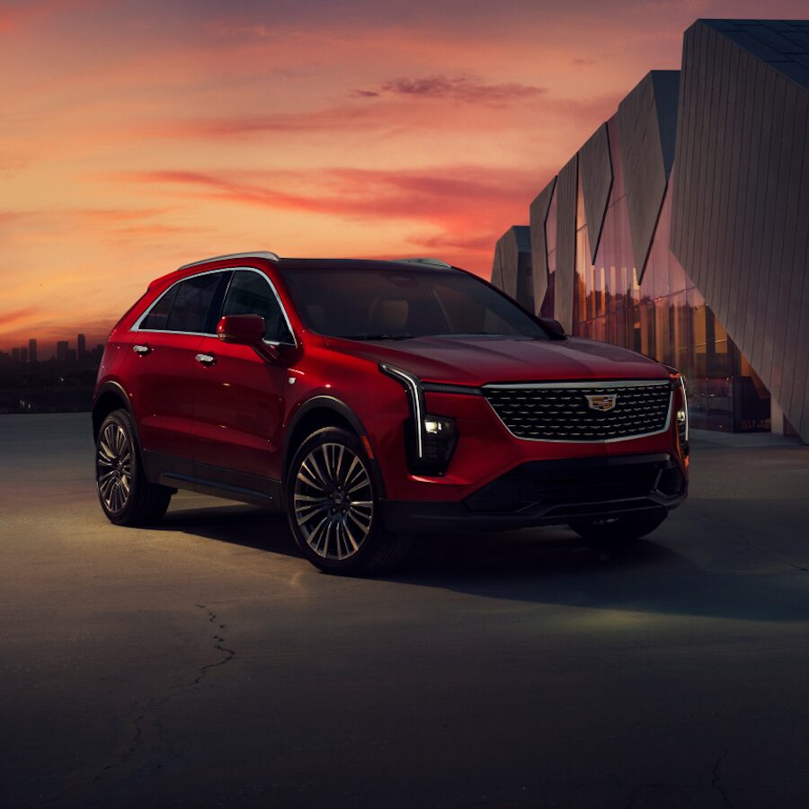 2024 Cadillac XT4 Parked at Dusk in Front of a Modern Building