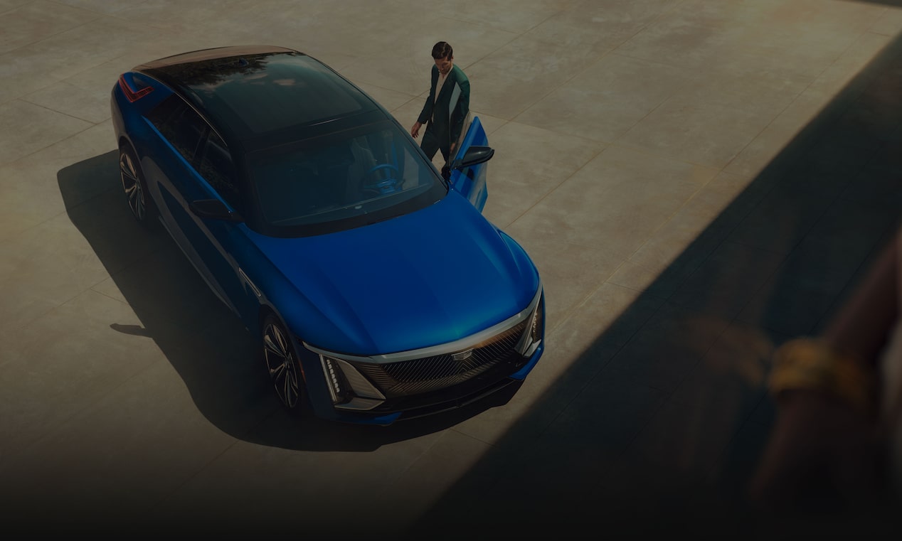 An Aerial View of a Man Entering His Cadillac CELESTIQ