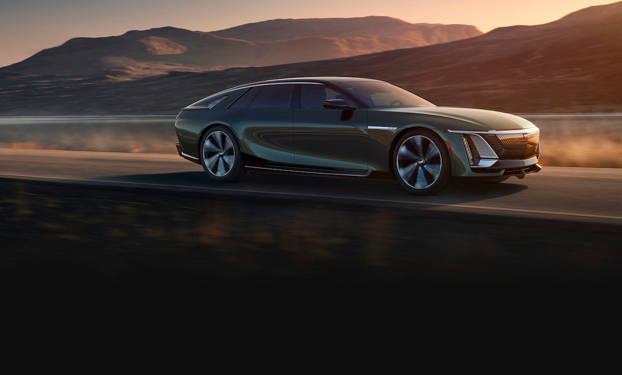 The Cadillac CELESTIQ Speeding Through an Open Desert Mountain Road