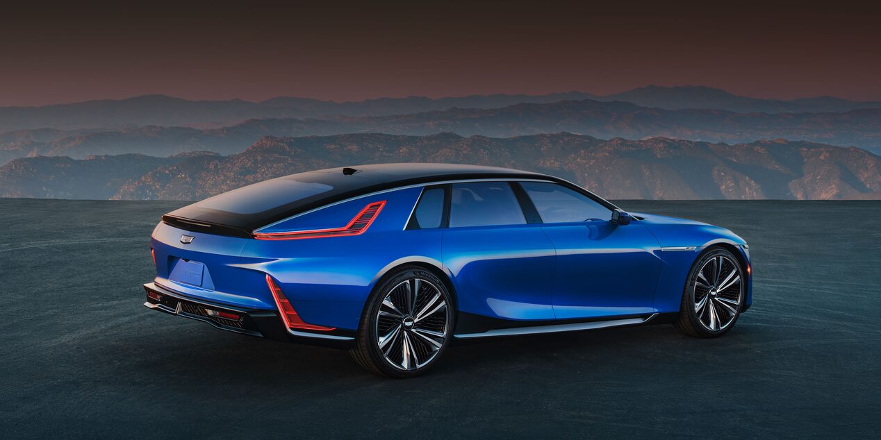 The Side Profile of the Luxurious Cadillac CELESTIQ with a Magnificent Mountain Sunset