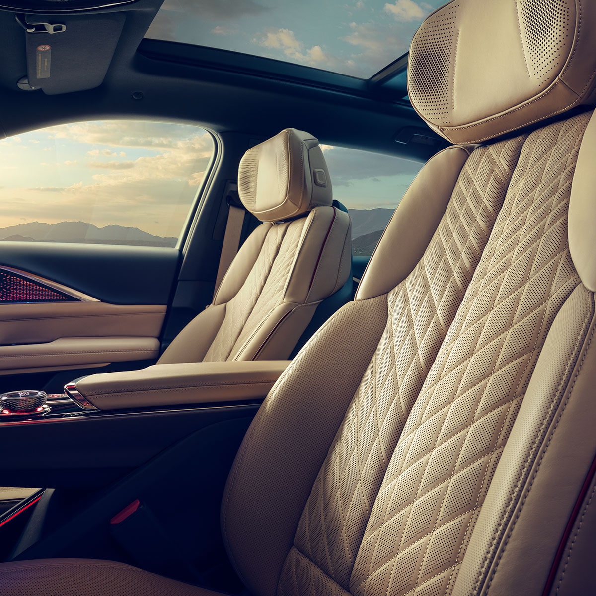 The Cadillac LYRIQ Parked in a Garage while Charging with a Gorgeous Sunset Backdrop
